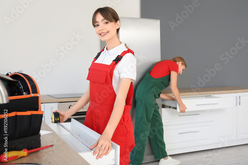 Female worker measuring dra...