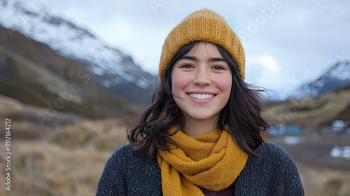 Smiling woman in winter landscape, happy and joyful expression, adventure and travel photography
