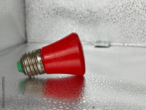 red light bulb in a box
