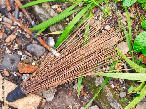 Fotografie broom made from coconut leaf bones for cleaning the yard