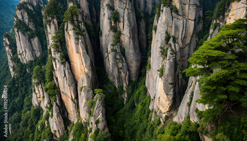 Majestic sandstone columns emerging from a lush valley in zhangjiajie national forest park, china photo