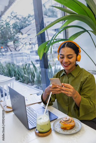 Wallpaper Mural Businesswoman using smart phone in cafe Torontodigital.ca