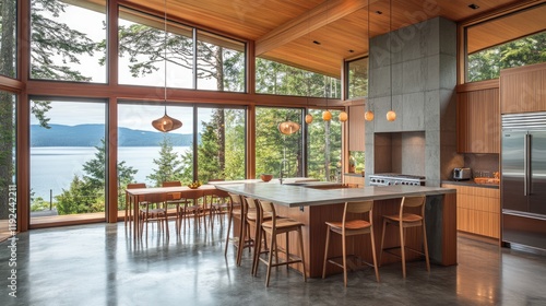Gray kitchen design with wooden bar stools, a clean bar counter, and panoramic windows.