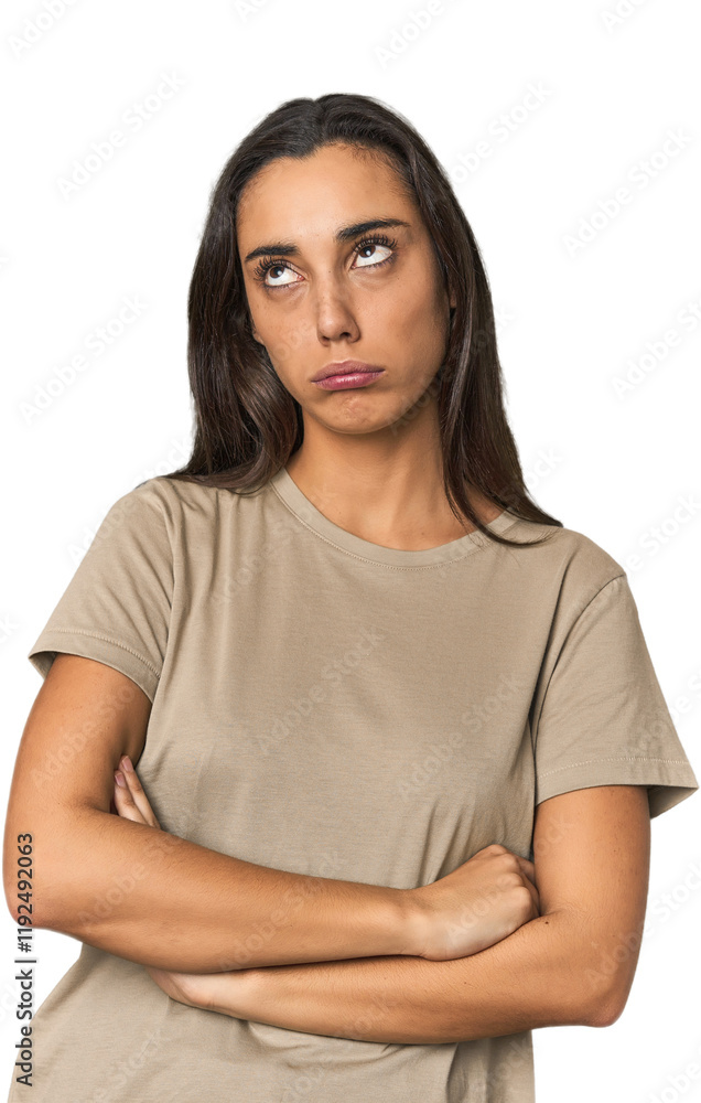 Hispanic young woman tired of a repetitive task. Hispanic young woman tired of a repetitive task.