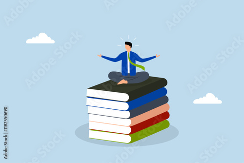 intelligent successful businessman reflecting and acquiring new abilities on a pile of business literature. 