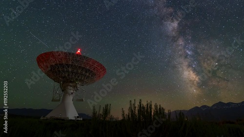 Panning Time Lapse Shot Of Telecommunication Equipment Under Stars At Night - Big Pine, California