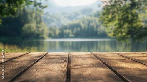 Tranquil Empty Wooden Table Overlooking Blurred Summer Lake Surrounded by Lush Green Trees and Scenic Mountain View