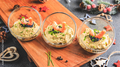 Verrine avocado shrimp pink fresh cheese guacamole chives cream lumpfish roe - decorated for Christmas photo