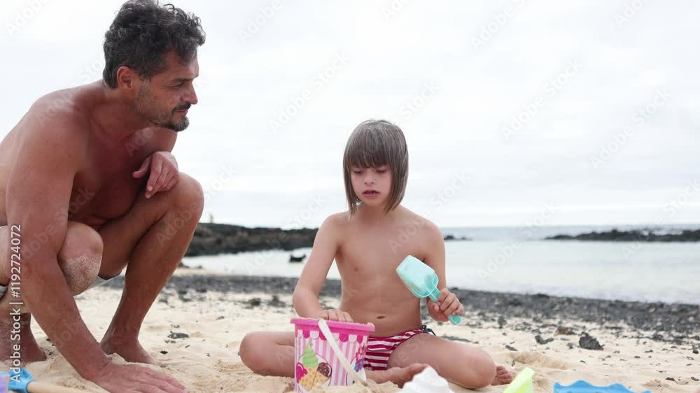Joyful moments with a little girl with down syndrome at beach Joyful moments with a little girl with down syndrome at beach