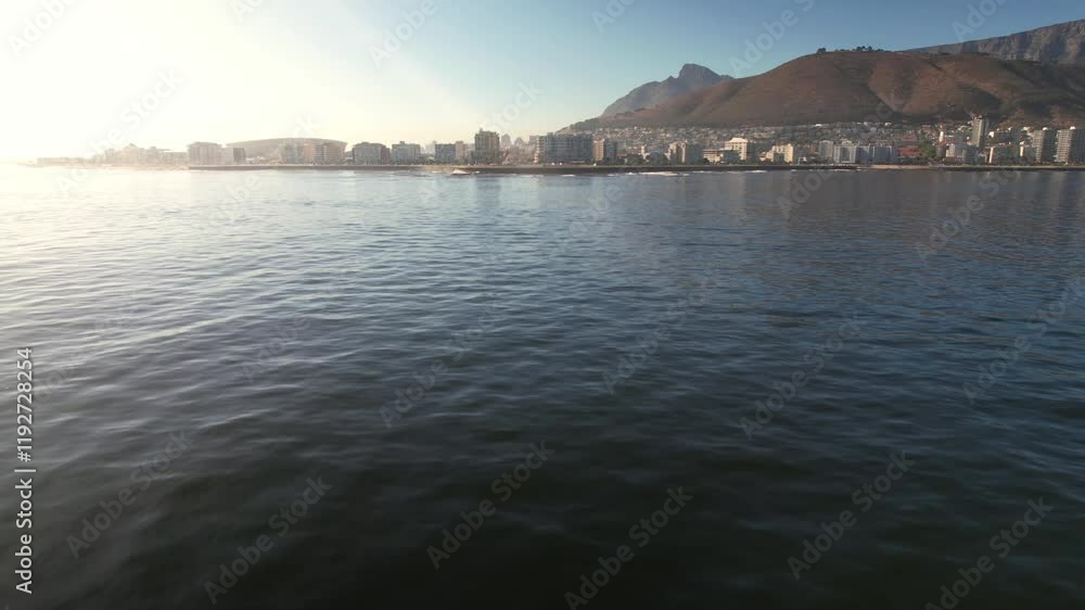 Cape Town's vibrant waterfront city offers stunning views, with the ocean meeting the urban landscape, creating a perfect blend of city and sea. Cape Town's vibrant waterfront city offers stunning views, with the ocean meeting the urban landscape, creating a perfect blend of city and sea.