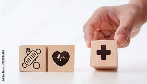 Close up man hand arranging wood block with healthcare medical icon on white background. Health care and Health insurance concept. icon