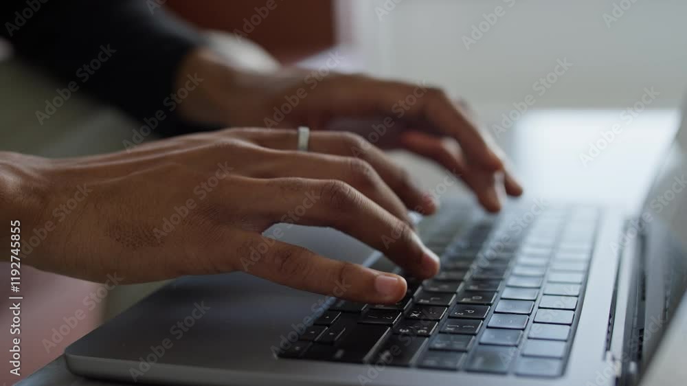Close-Up of Hands Typing on Laptop Keyboard Close-Up of Hands Typing on Laptop Keyboard