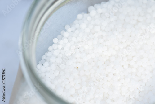 Urea granules (carbamide, CO(NH2)2) - nitrogenous mineral fertilizer.
