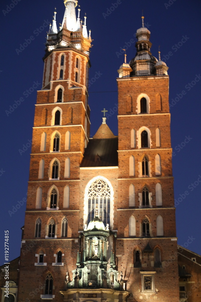 scenic view of city in the evening lights. landscape of the old town street. people like to walk along the historical part of the city. scenic view of city in the evening lights. landscape of the old town street. people like to walk along the historical part of the city.