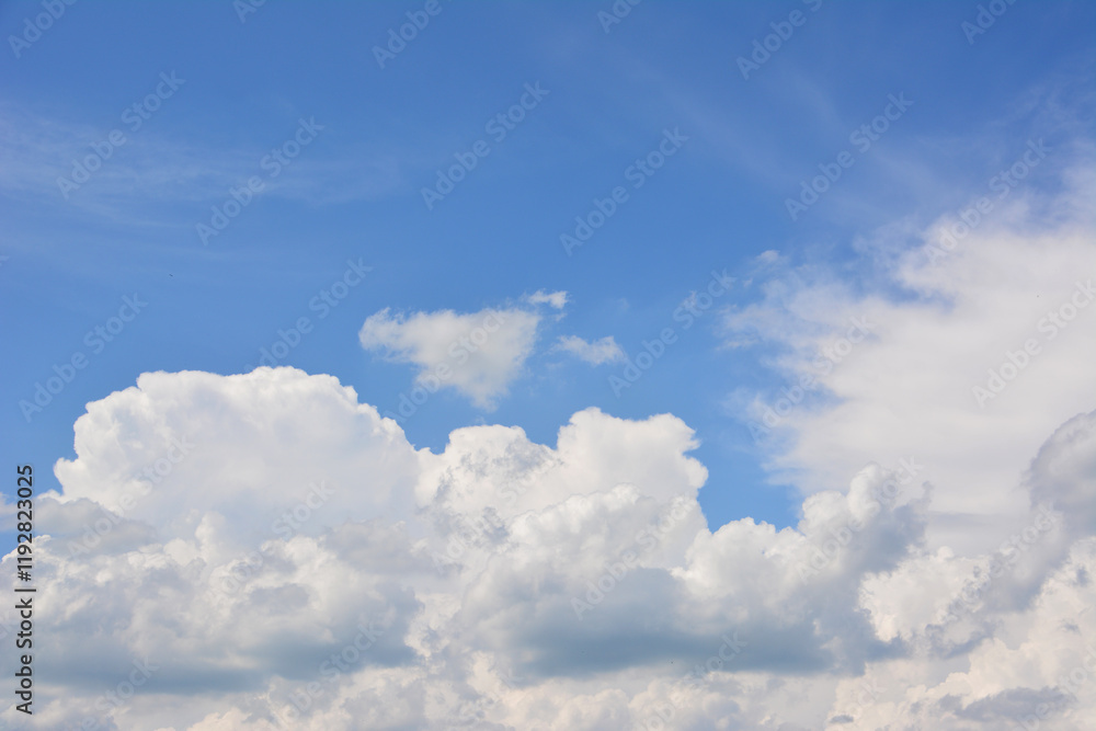 a background of the blue sky with white cumulus clouds  