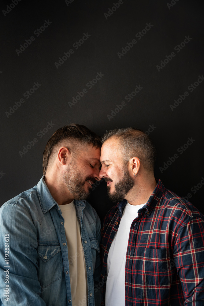 Loving moment between a gay couple showing affection and joy Loving moment between a gay couple showing affection and joy
