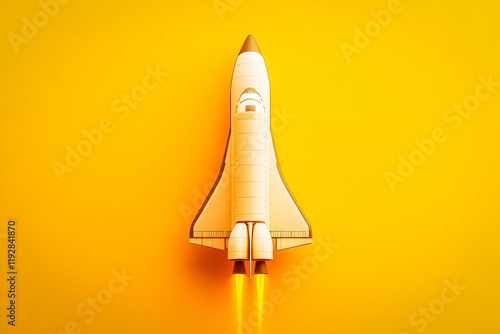 A detailed model of a space shuttle placed carefully against a vivid yellow background, showcasing aerospace and educational themes. photo