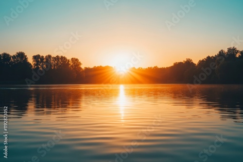 sunrise over a peaceful lake, with warm colors and a feeling of optimism and new possibilities, mindfulness practice and meditation photo