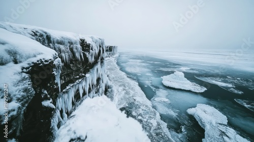 Wallpaper Mural A Frozen Cliffside Wonderland with Jagged Ice Overlooking the Ocean. Winter Season background Torontodigital.ca
