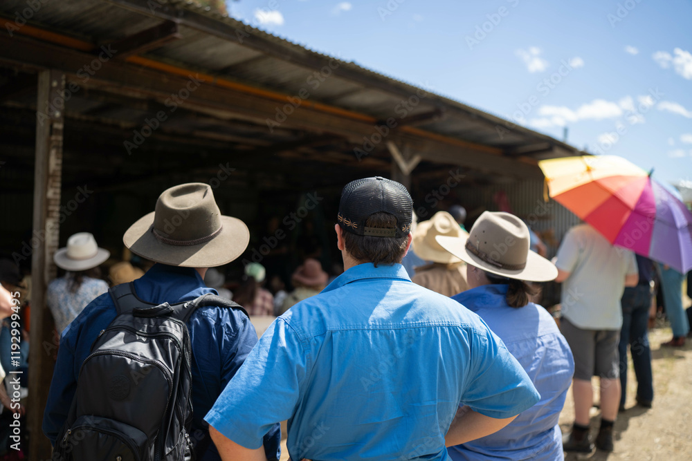 farmers at a field day learning on a farm. learning about agriculture and innovation listen to experts. farming community together in for a growers field day talking to agronomist farmers at a field day learning on a farm. learning about agriculture and innovation listen to experts. farming community together in for a growers field day talking to agronomist