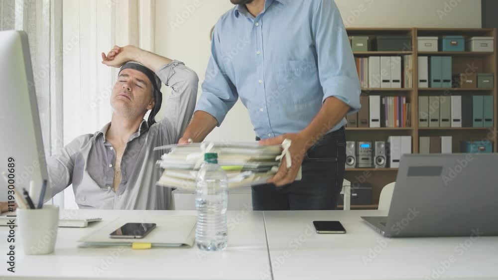 Lazy office worker suffering from the heat Lazy office worker suffering from the heat