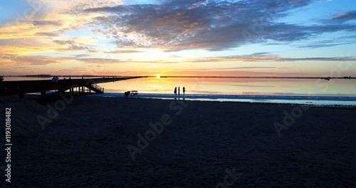 Sunset over Qarhan Salt Lake. It is the largest salt lake in China and the second largest salt lake in the world. photo