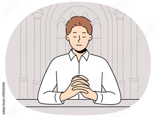 Man praying sitting on bench in temple seeking spiritual support in catholic and christian religion. Guy closes eyes and praying standing in orthodox cathedral and needs help of lord