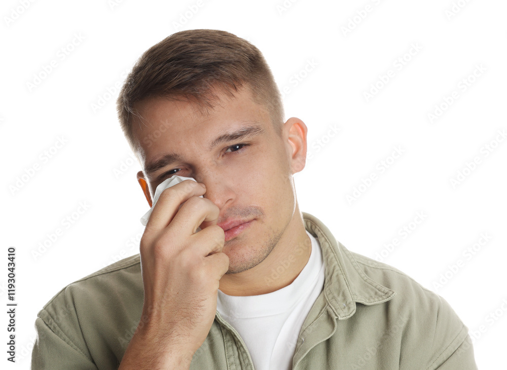 Crying man wiping tears with tissue on white background Crying man wiping tears with tissue on white background