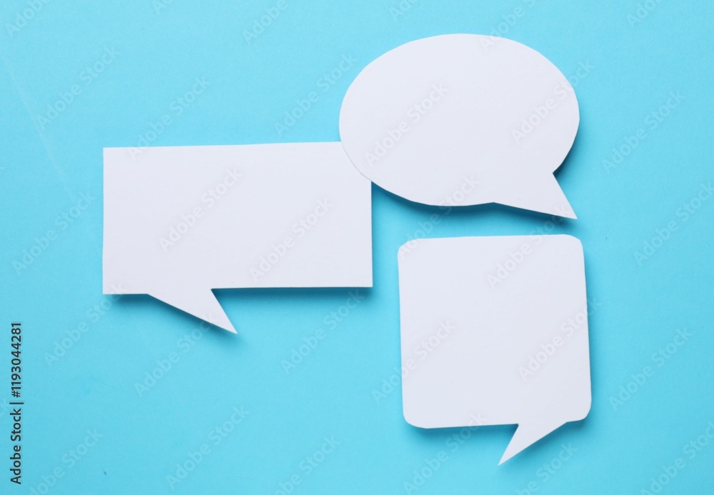 Blank speech bubbles on light blue background. Space for text Blank speech bubbles on light blue background. Space for text