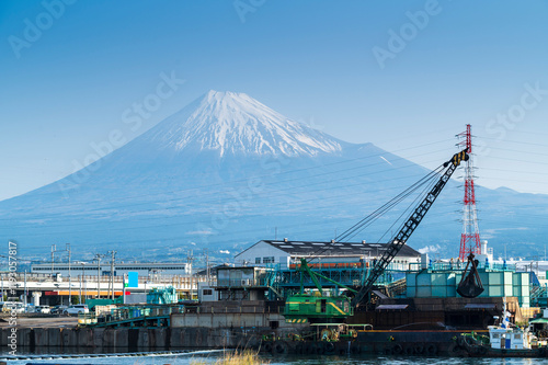 Industrail factory area  in FujiNomiya city with Fuji mountain and blue sky background view, Fujinomiya City, Shizuoka, Japan photo