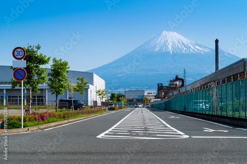 Obraz na płótnie Road and industrail factory area in FujiNomiya city with Fuji mountain and blue sky background view, Fujinomiya City, Shizuoka, Japan w salonie