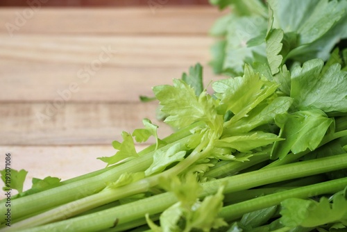 Celery vegetable on wood background photo