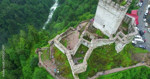 4K UHD aerial drone footage of the historic Zilkale castle surrounded by a misty forest in Çamlıhemşin. A breathtaking view of nature, history, and atmospheric beauty.