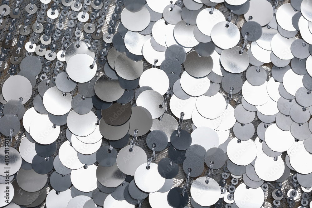 Φωτογραφία Top down view of big, grey spangle fabric on the table.
