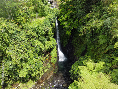 The drone view of Pete Waterfall in Banyumas Regency, Central Java, Indonesia. It was taken on January 13, 2025 by a professional. It's a wonderful landscape with a nice view