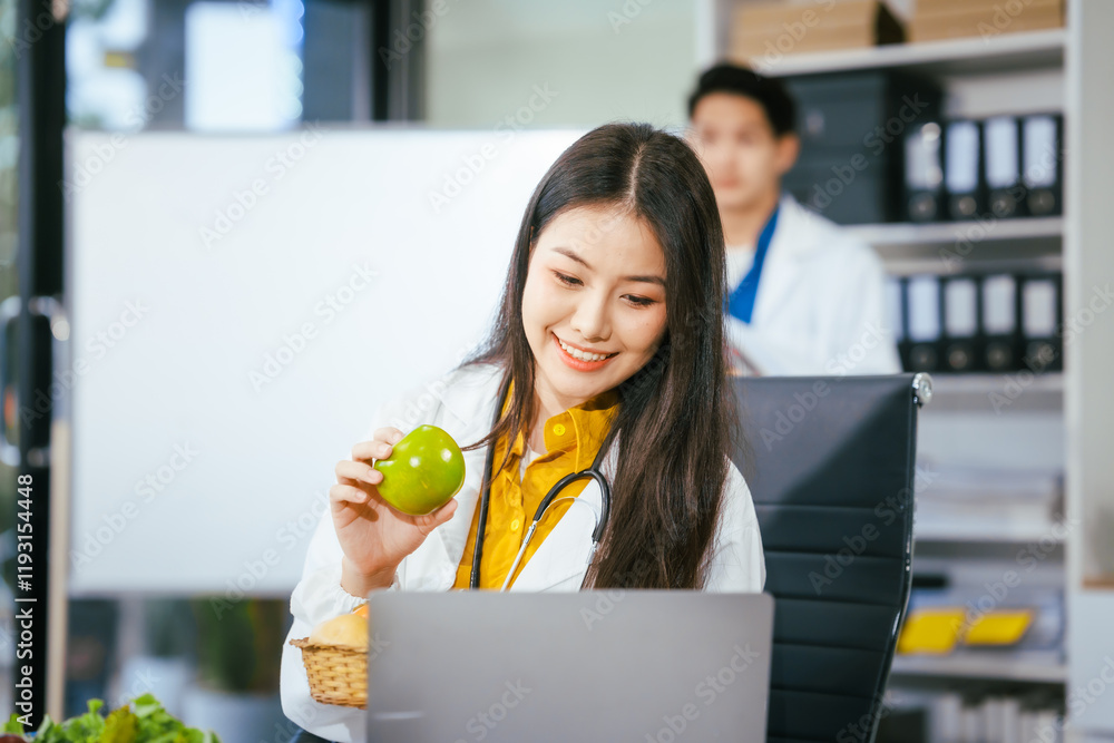Two nutritionists,female and male, work in a hospital, analyzing vegetable and fruit salads, offering online advice, helping patients embrace clean eating habits and weight control for better health Two nutritionists,female and male, work in a hospital, analyzing vegetable and fruit salads, offering online advice, helping patients embrace clean eating habits and weight control for better health