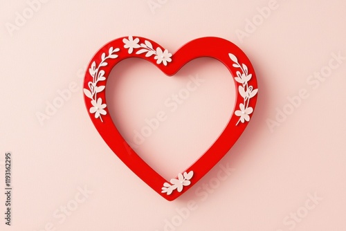 A vibrant red heart shape adorned with floral designs, set against a soft pink background, symbolizing love and affection.