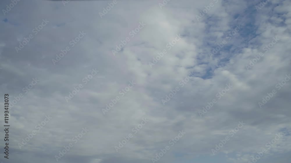 Timelapse, highcumulus clouds sweeping across the blue sky after the rain Timelapse, highcumulus clouds sweeping across the blue sky after the rain