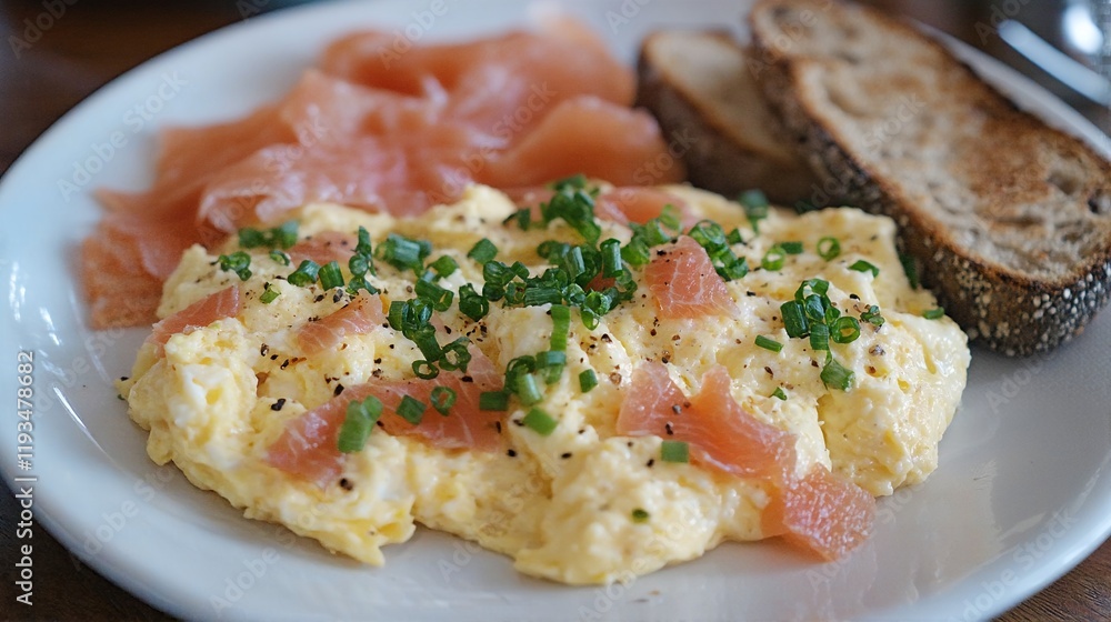Scrambled eggs with smoked salmon and chives. Scrambled eggs with smoked salmon and chives.