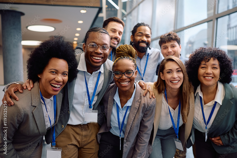 Portrait of happy multiracial business team at convention center looking at camera. Portrait of happy multiracial business team at convention center looking at camera.