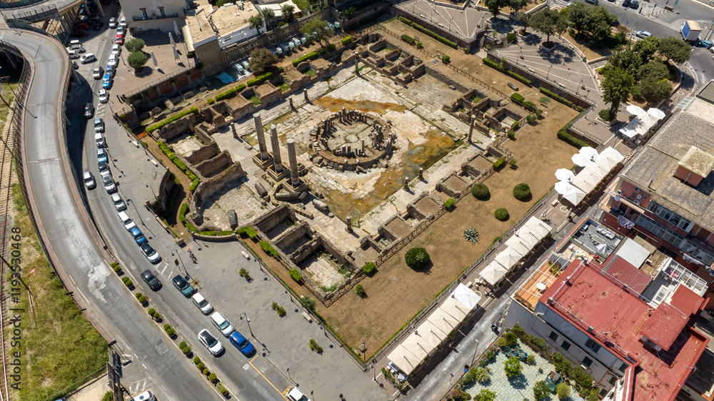 Fototapeta premium Aerial view the Macellum of Pozzuoli, near Naples, Italy. It was market building of the Roman colony of Puteoli. It was mistakenly known as the Temple of Serapis.