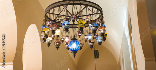 Hassan II Mosque, Morocco - March 26, 2024: Exquisite ceiling and chandeliers inside the mosque. Showcasing Moroccan artistic tradition and advanced architectural techniques.