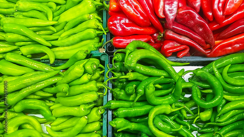 Colorful display of fresh peppers at a market, symbolizing food prices and trends