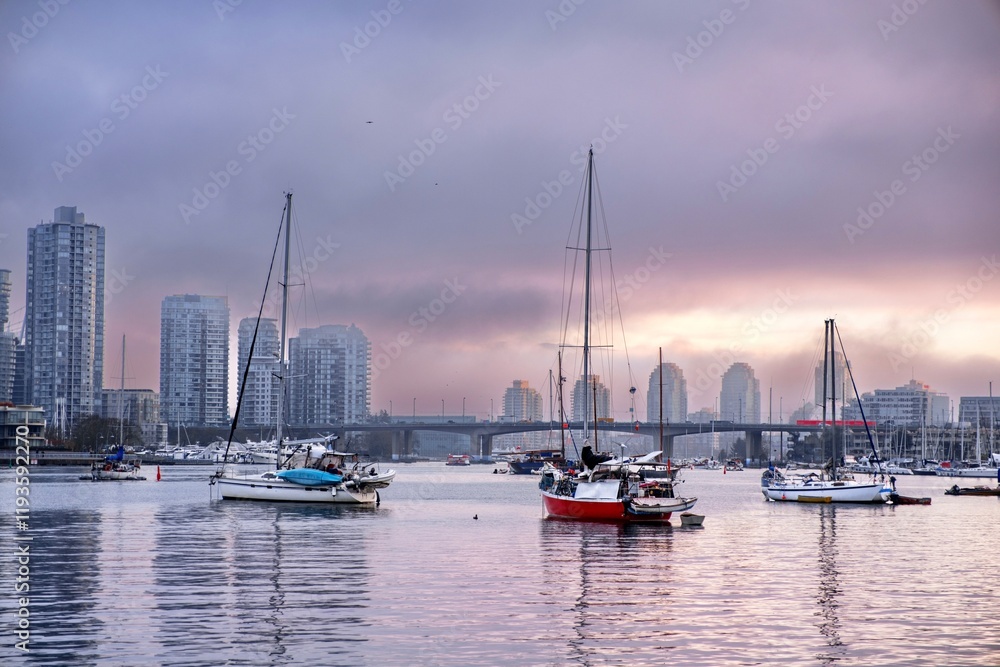 Boats in the harbor, bridge and city view . Morning fog in Vancouver False Creek. British Columbia. Canada Boats in the harbor, bridge and city view . Morning fog in Vancouver False Creek. British Columbia. Canada