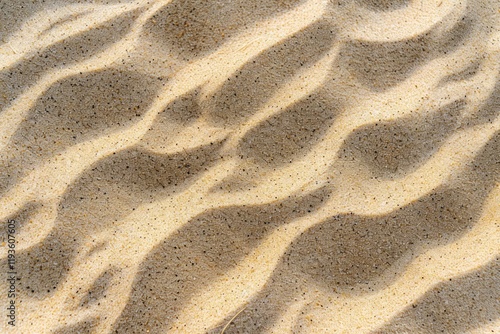 Image of Beach yellow sand surface. Texture for background usage photo