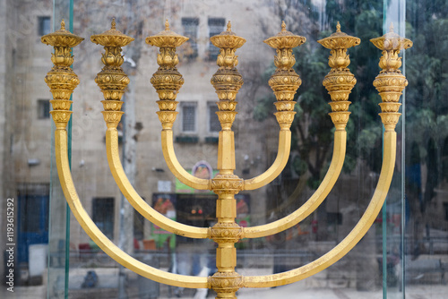 An exact replica of the golden Temple menorah, a seven-branched candelabrum that is described in the Hebrew Bible as having been used in the Tabernacle and in the Temple in Jerusalem. photo