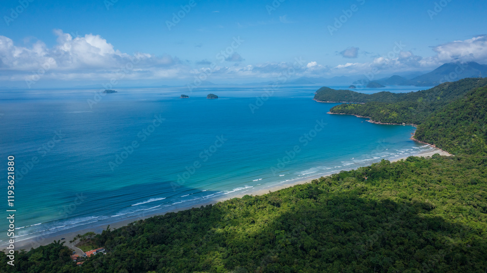 Beautiful aerial view of a preserved area, Fazenda Beach, within the Serra do Mar State Park, a destination for sustainable and ecological tourism in Atlantic Rainforest, between Montains and Sea. Beautiful aerial view of a preserved area, Fazenda Beach, within the Serra do Mar State Park, a destination for sustainable and ecological tourism in Atlantic Rainforest, between Montains and Sea.
