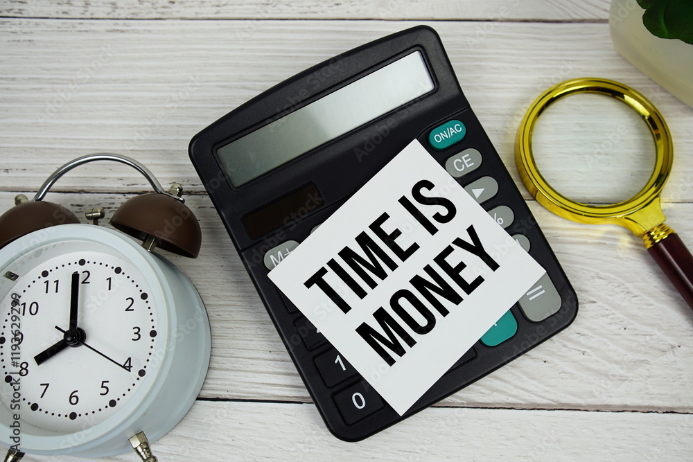 Time Is Money text message on sticky note with magnifying glass, alarm clock and calculator on wooden background Time Is Money text message on sticky note with magnifying glass, alarm clock and calculator on wooden background