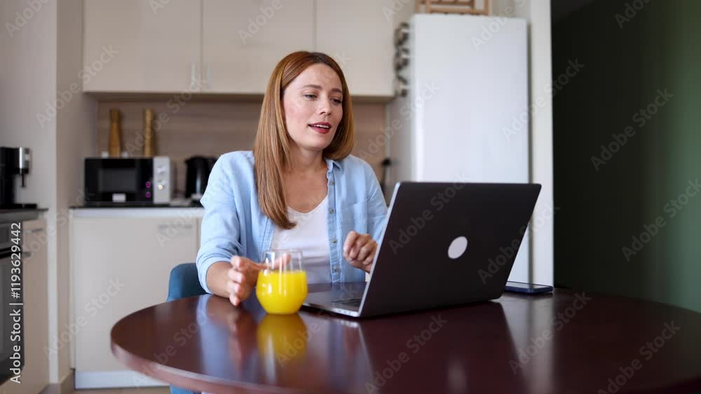 Young woman working online at her home office Young woman working online at her home office