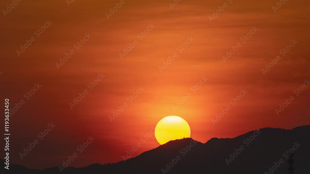 Time lapse of stunning sunrise and sunset over mountains with vibrant colors altering the sky Time lapse of stunning sunrise and sunset over mountains with vibrant colors altering the sky